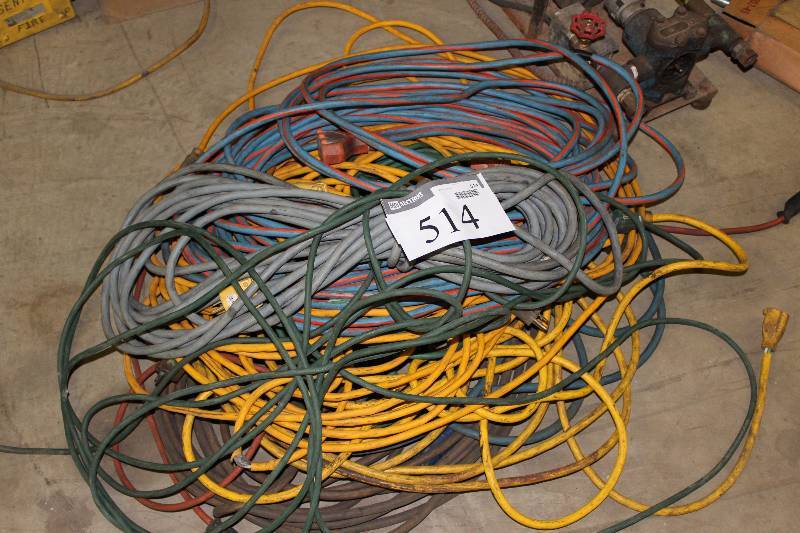 lot 514 image: Floor Lot of Extension Cords Includes Cord Reel.