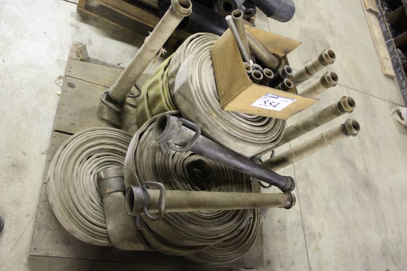 lot 554 image: Pallet Lot Including Fire Hoses Fire Hose Adapters Fire Hose Nozzles.
