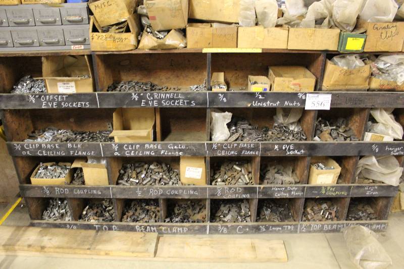 lot 556 image: Storage Shelf Lot Including Eye Sockets, Grinnel & Offset Clip Base Ceiling Flange Hanger Supplies Storage Shelf, 96 x 13 x 48.