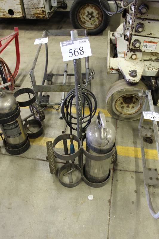 lot 568 image: Torch Cart with Acetylene Torch Holds 2 Tanks.  Tanks are gone because they were rented. Includes Fire Extinguisher.