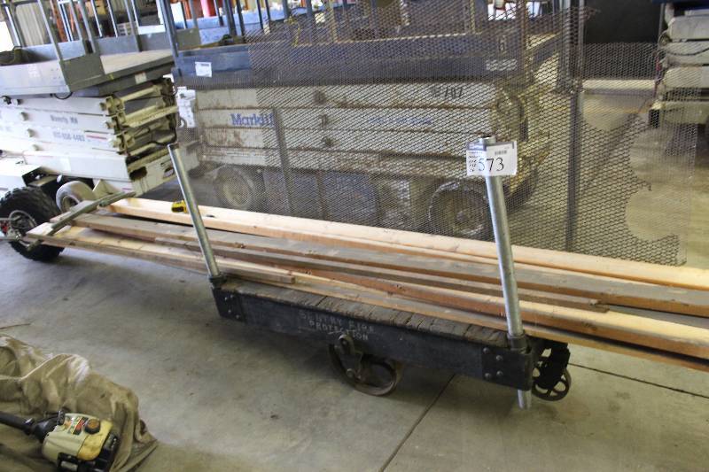 lot 573 image: Push Cart wLower Shelf & Wheels Includes Contents Wooden Boards 24 x 53 x 16.