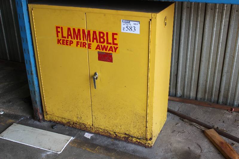 lot 583 image: Eagle Fire Cabinet wDouble Doors Model 1932, 30 Gal Cap Includes Metal Gas Cans.