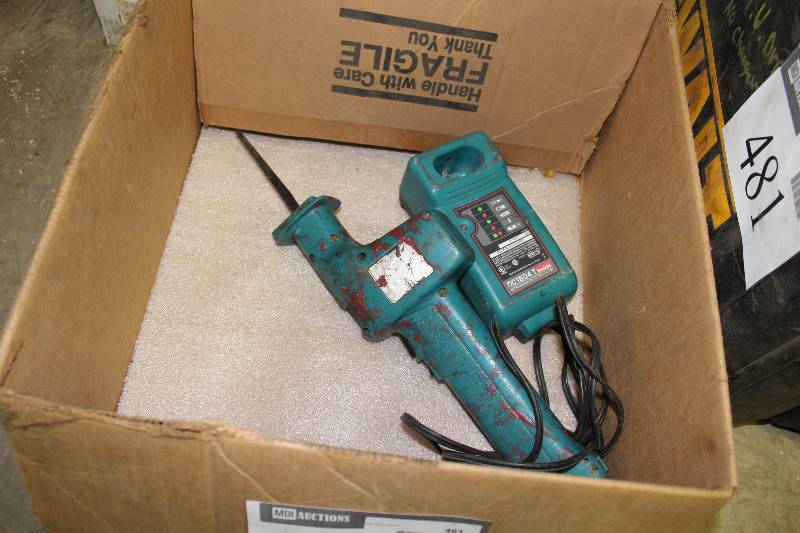 lot 483 image: Lot of (2) Makita Electric Hand Saw Makita Battery Charger.
