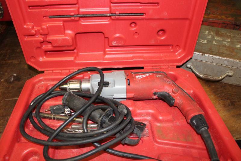 lot 415 image: Milwaukee 12 Hammer Drill wHard Case & Accessories.