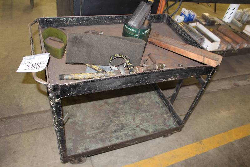 lot 588 image: Push Cart wLower Shelf & Wheels Includes Contents 24.5 x 38 x 31.5.