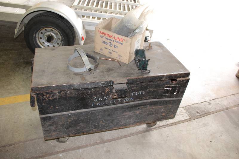 lot 589 image: Metal Container wWheels & Top Hatch lid Includes Contents 20 x 42 x 25.