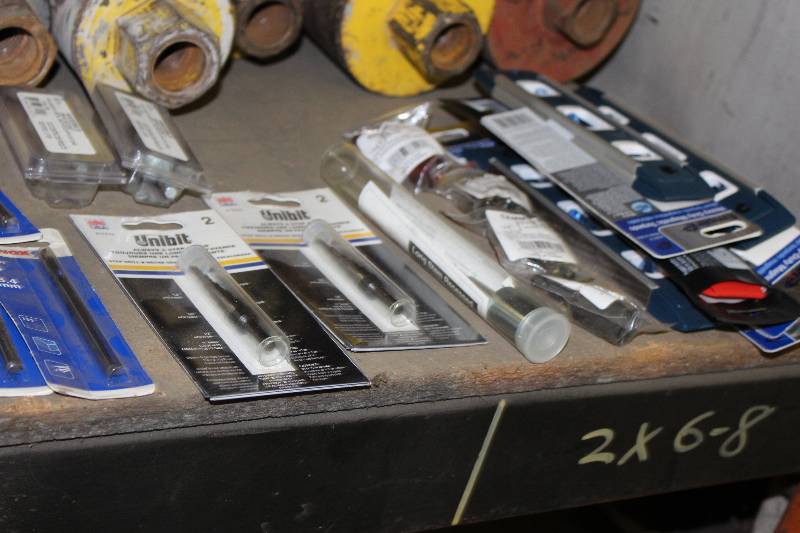lot 601 image: Shelf Lot Including Red Head Carbide Drill Bit, app. 7 ct Long Drill Bit Milwaukee Accessories, New And More.