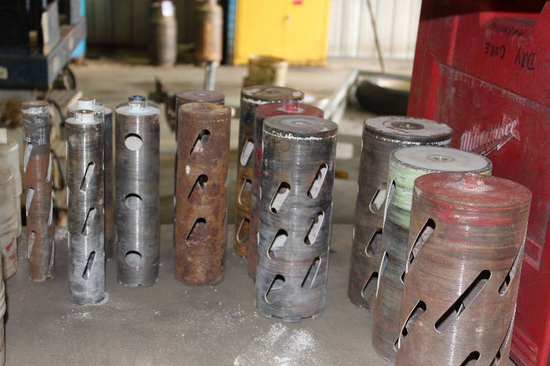 lot 600 image: Shelf Lot Including Drill Bits Milwaukee Dry Core Power Tool wHard Case Measuring Tapes And More.