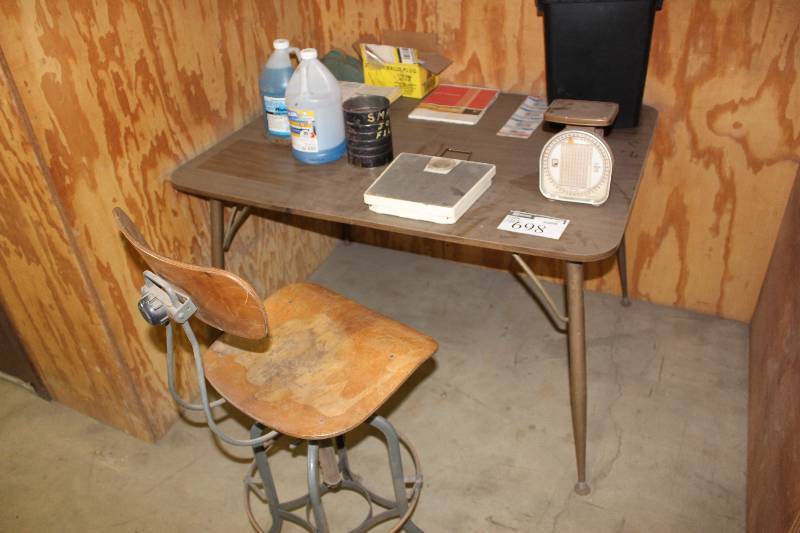 lot 698 image: Corner Lot Including Folding Table Chair wMetal Base Contents of Table Include Scales Windshield Wiper Fluid And More.