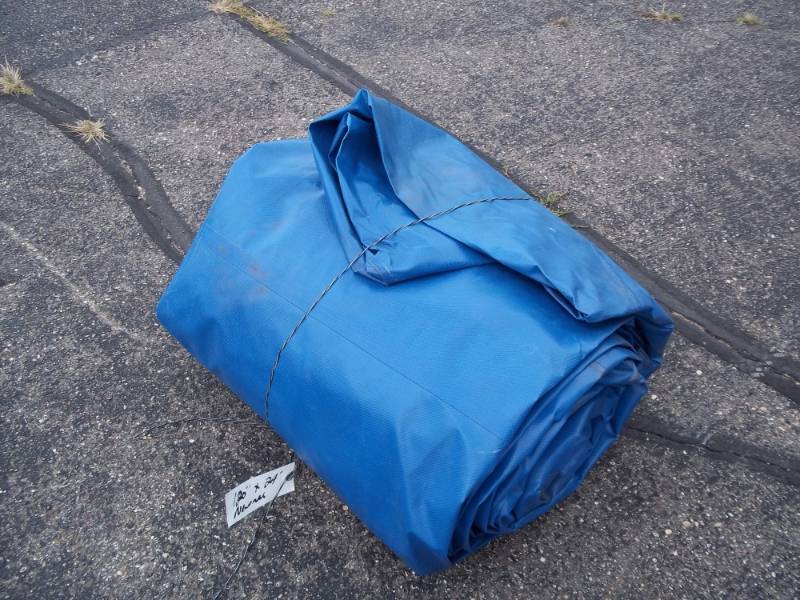 Tarp good for wood pile may have some holes or rips,  120 x 24