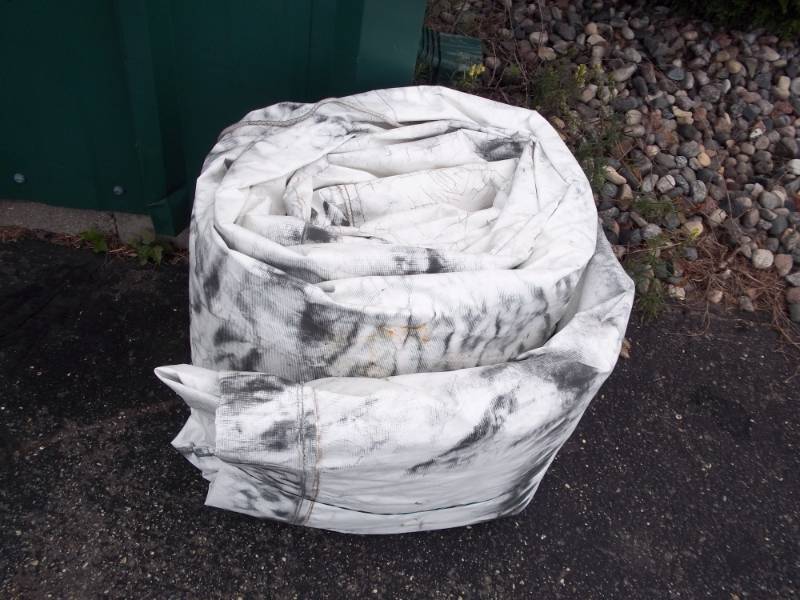 Tarp good for wood pile may have some holes or rips,  108 x 23