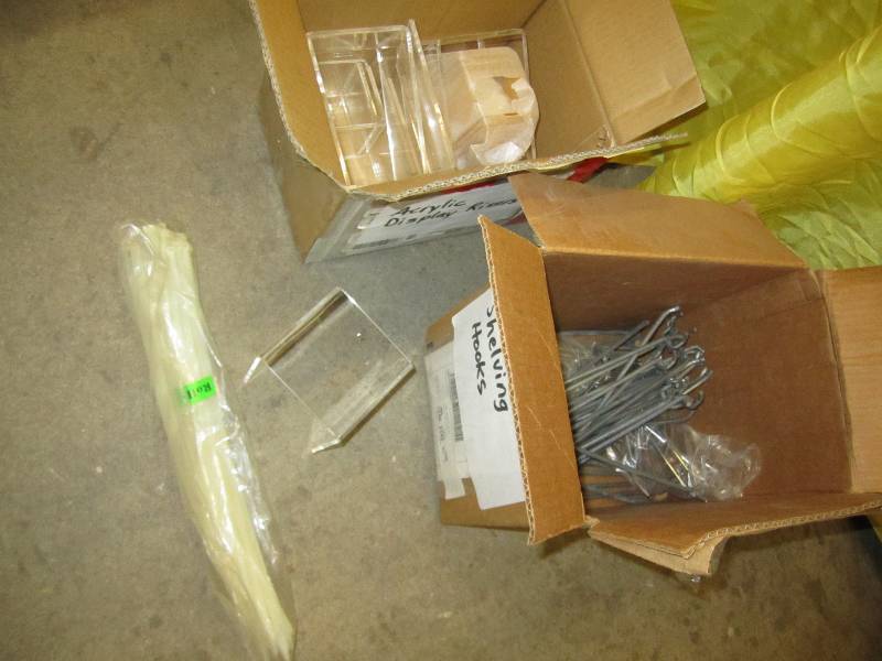 Lot of peg hooks and acrylic risers...