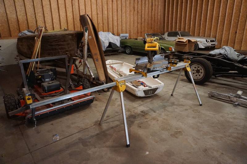 lot 32 image: DeWalt Model DW708 12 Compound Slide Miter Saw With DeWalt DW Portable Stand
