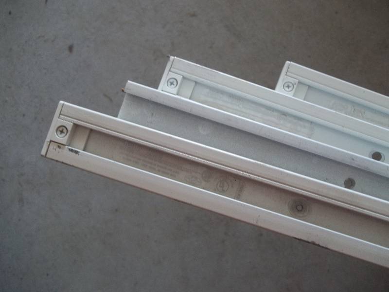 Four Industrial Track Lighting Fixtures with Bulbs and Four Tracks