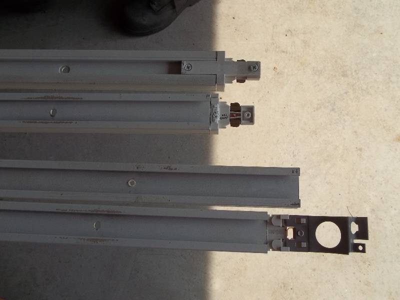 Four Industrial Track Lighting Fixtures with Bulbs and Four Tracks
