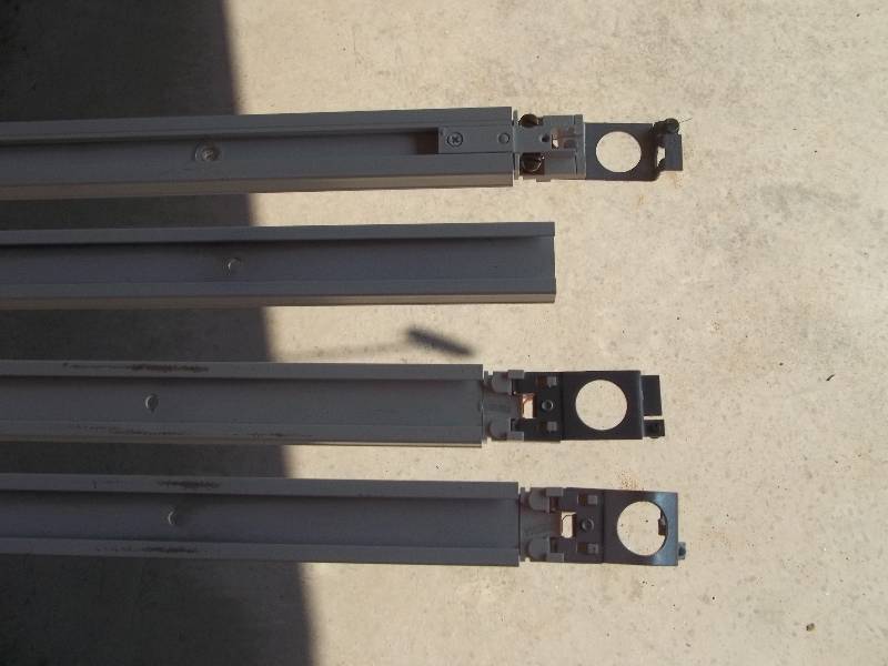 Four Industrial Track Lighting Fixtures with Bulbs and Four Tracks