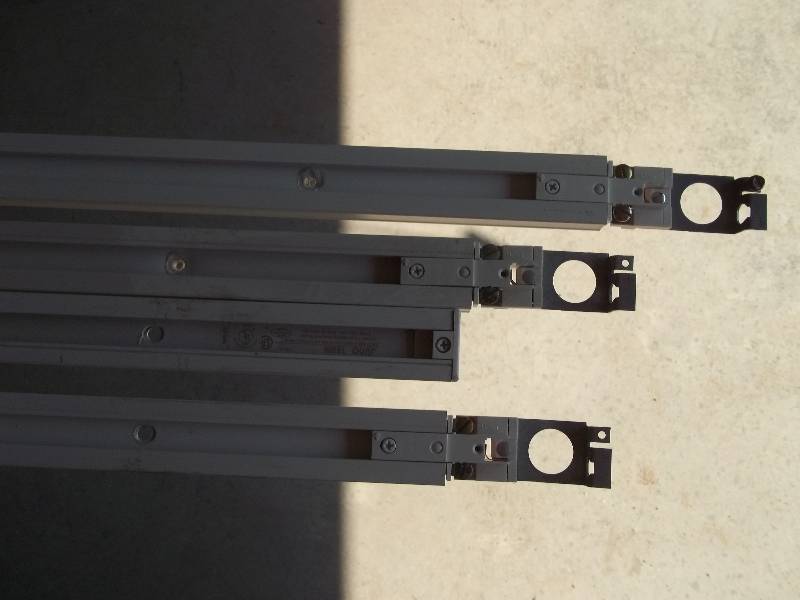 Four Industrial Track Lighting Fixtures with Bulbs and Four Tracks