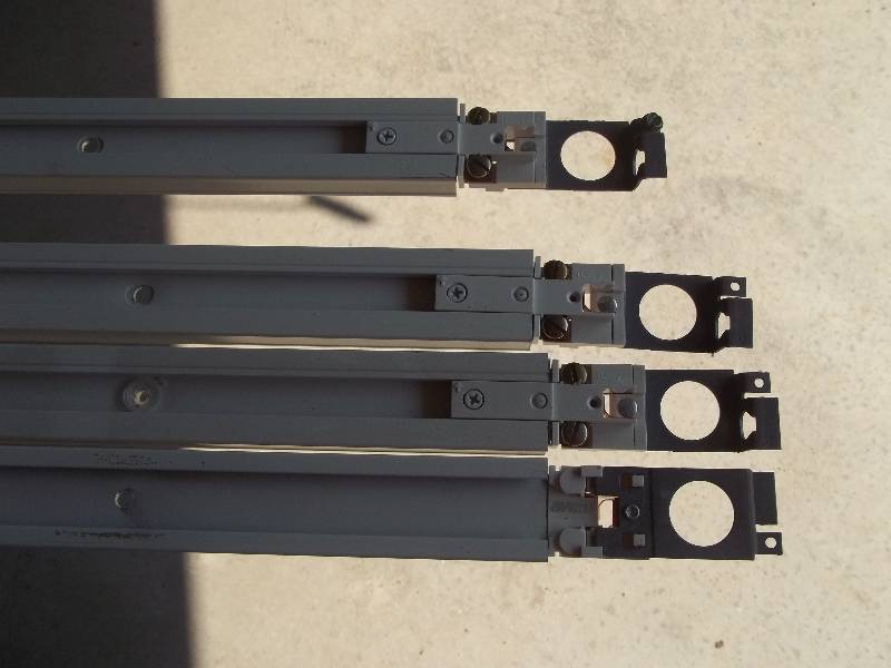 Four Industrial Track Lighting Fixtures with Bulbs and Four Tracks