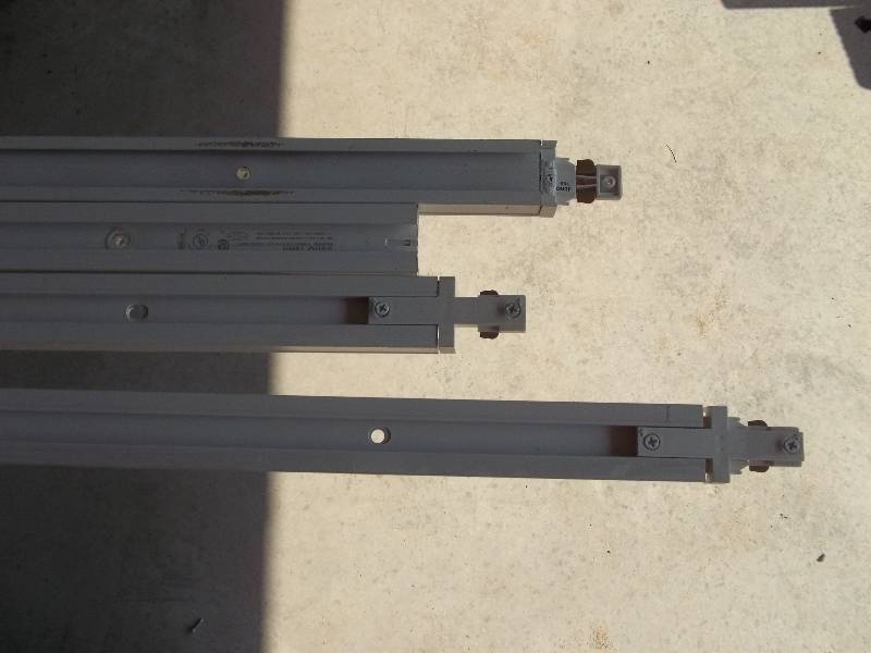 Four Industrial Track Lighting Fixtures with Bulbs and Four Tracks
