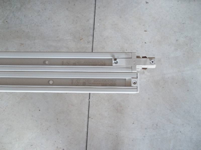 Eight Industrial Track Lighting Fixtures with Bulbs and Two Tracks