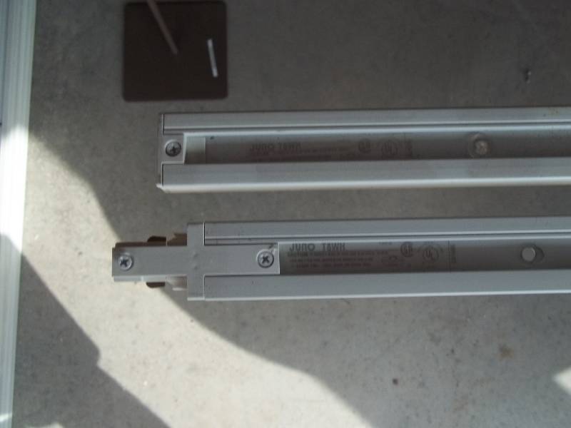 Eight Industrial Track Lighting Fixtures with Bulbs and Two Tracks