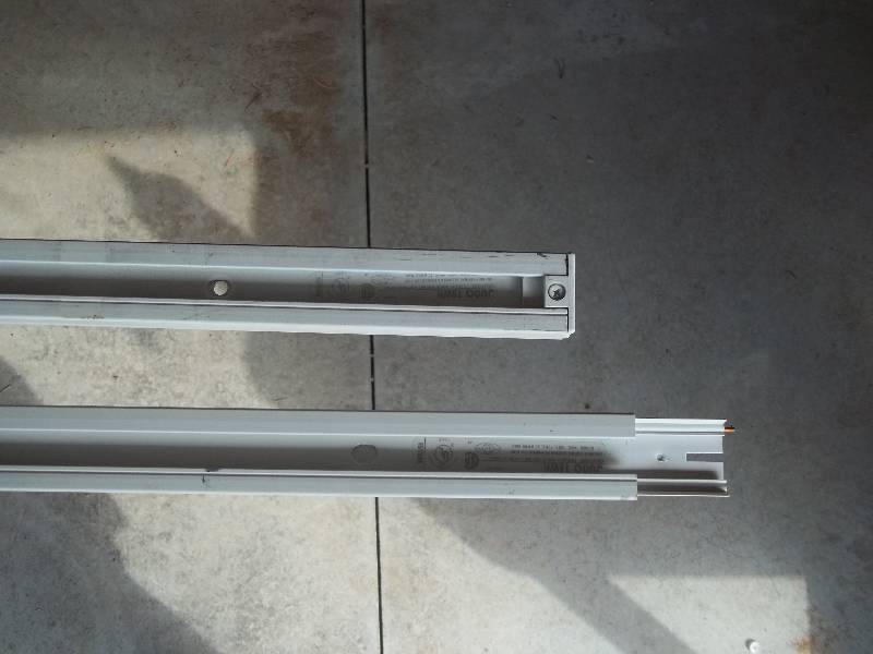 Eight Industrial Track Lighting Fixtures with Bulbs and Two Tracks