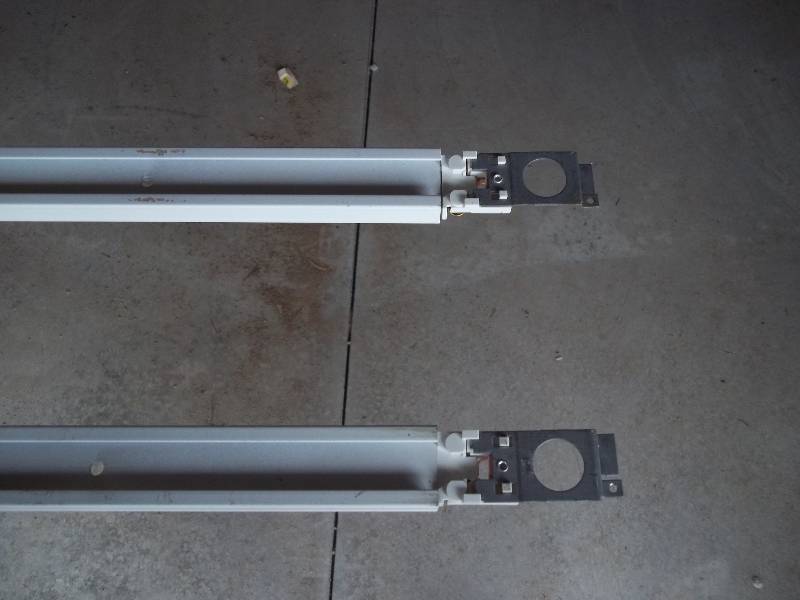 Eight Industrial Track Lighting Fixtures with Bulbs and Two Tracks