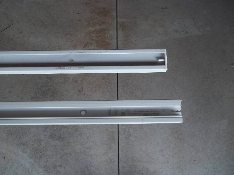 Eight Industrial Track Lighting Fixtures with Bulbs and Two Tracks