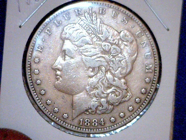 1884 Morgan Silver Dollar, see pict...