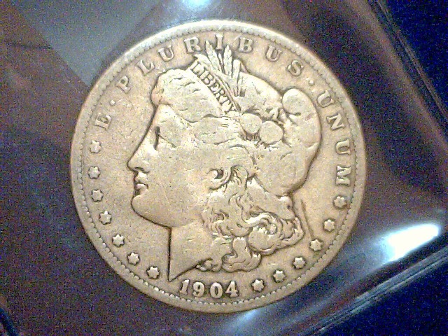 1904 Morgan Silver Dollar, see pict...
