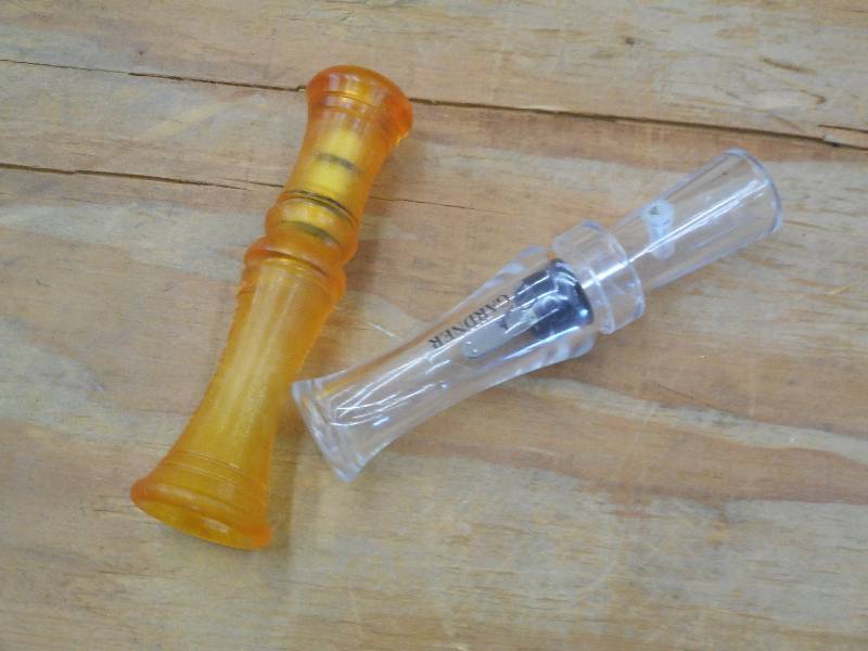 lot 35 image: (2) Wild Game Predator Calls ...