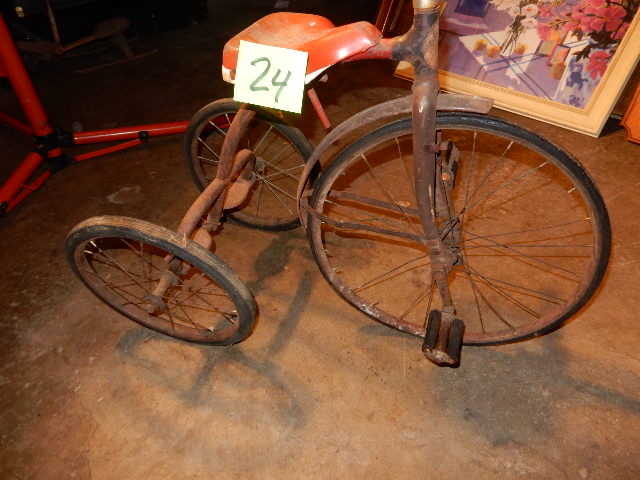 lot 24 image: Antique tricycle.. Original hard rubber wheels