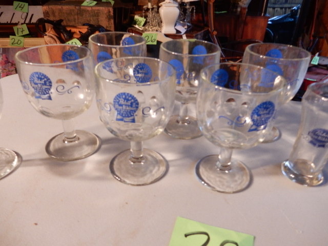 lot 29 image: 6 Pabst Blue Ribbon Pedestal Beer steins, 1 beer Glass.. 1, Schlitz Pedestal stein.