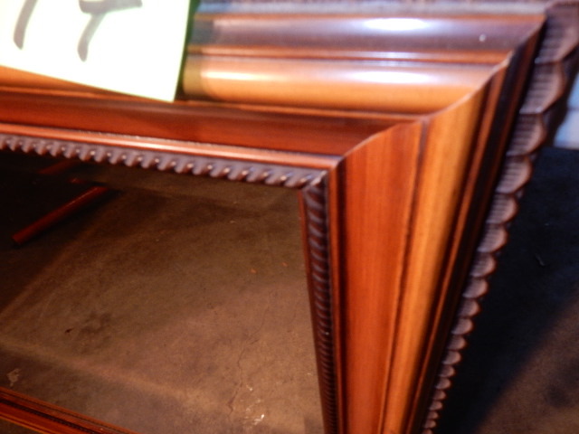 lot 17 image: Very nice Simulated wood beveled glass mirror.  43in x 31in.