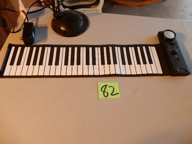 lot 82 image: Keyboard mat.. And flurorescent desk lamp
