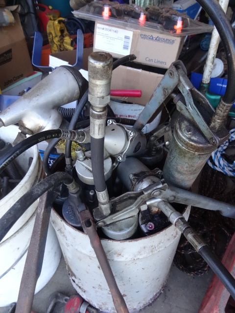 Bucket Full of Grease Guns