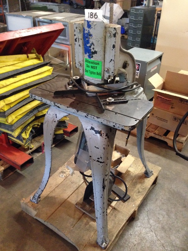 Foot operated metal notcher