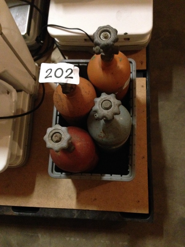 Lot of 4 small gas bottles