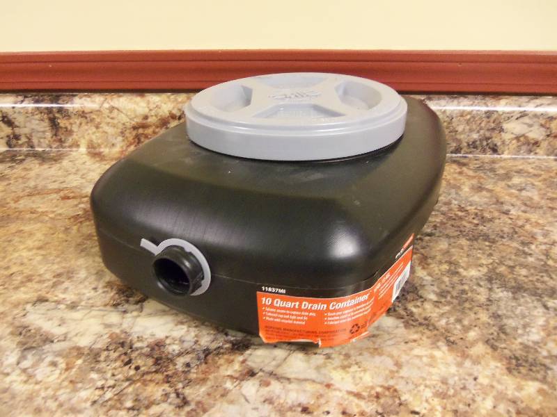 lot 83 image: Oil Drain Container