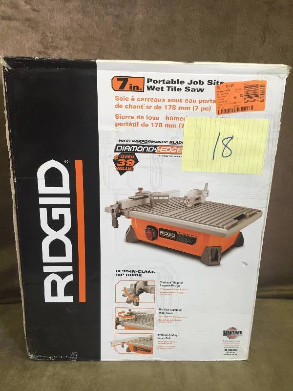 lot 18 image: Ridgid 7 Wet Tile saw used  works