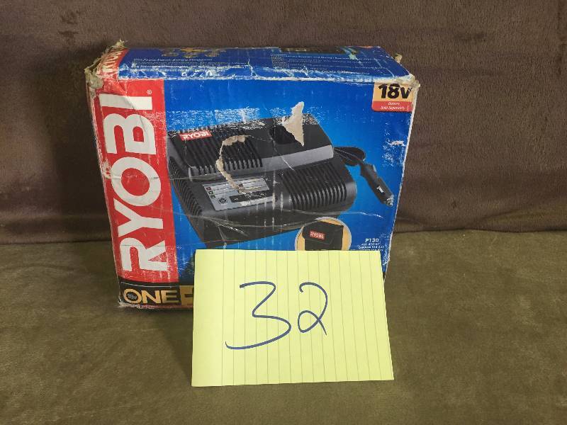 lot 32 image: Ryobi in vehicle charger