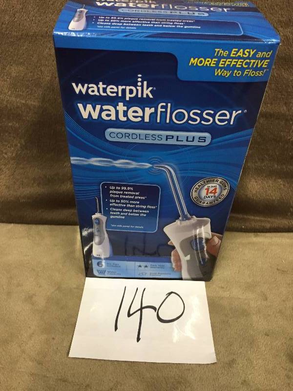 lot 140 image: Waterpik Waterflosser