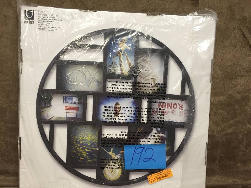 lot 192 image: Umbra Luna 9-Opening Collage Frame