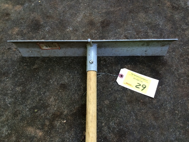 lot 29 image: Cement trowel  19 long x 4 wide with 54 handle   New - never used