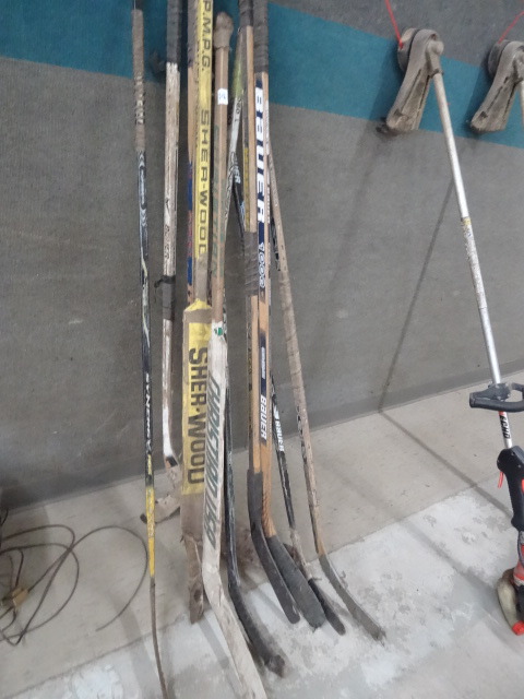 Large Lot of Hockey Sticks