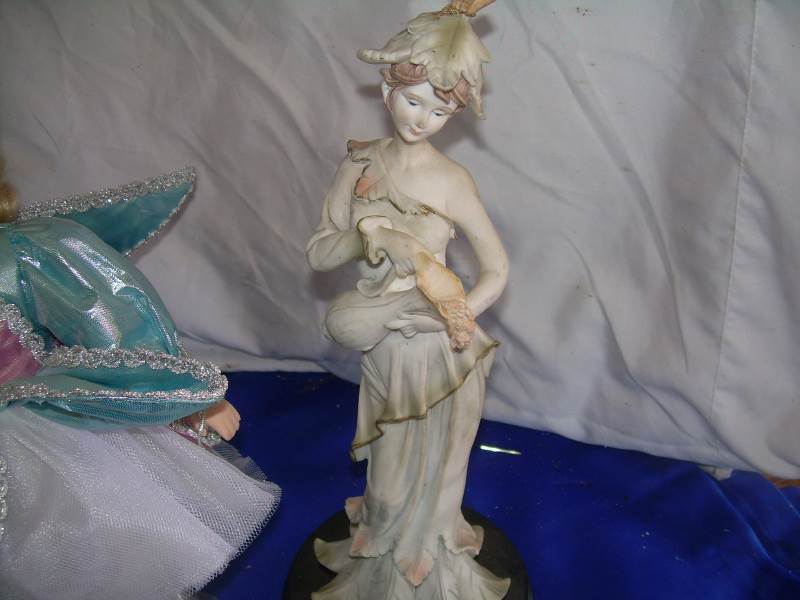 collector doll and vintage figurines