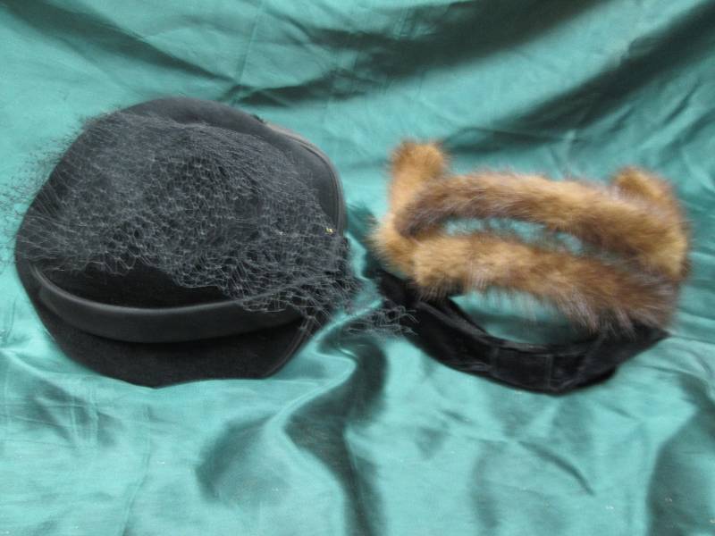 Black old time hat and a head band...