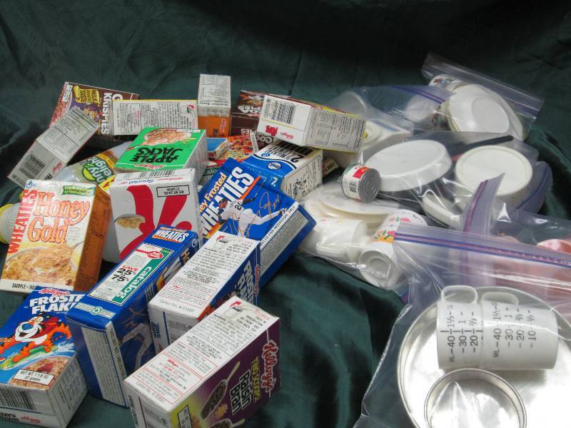 Kids dishes and empty box of toy fo...