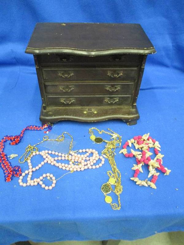 Musical jewelry box, has 4 drawers,...