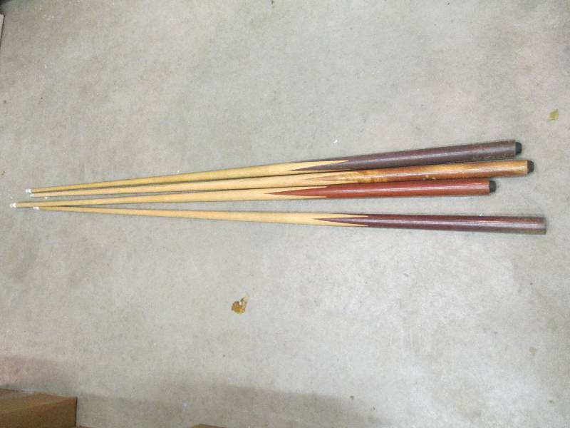 2 pairs of pool cues  49 long.  ...